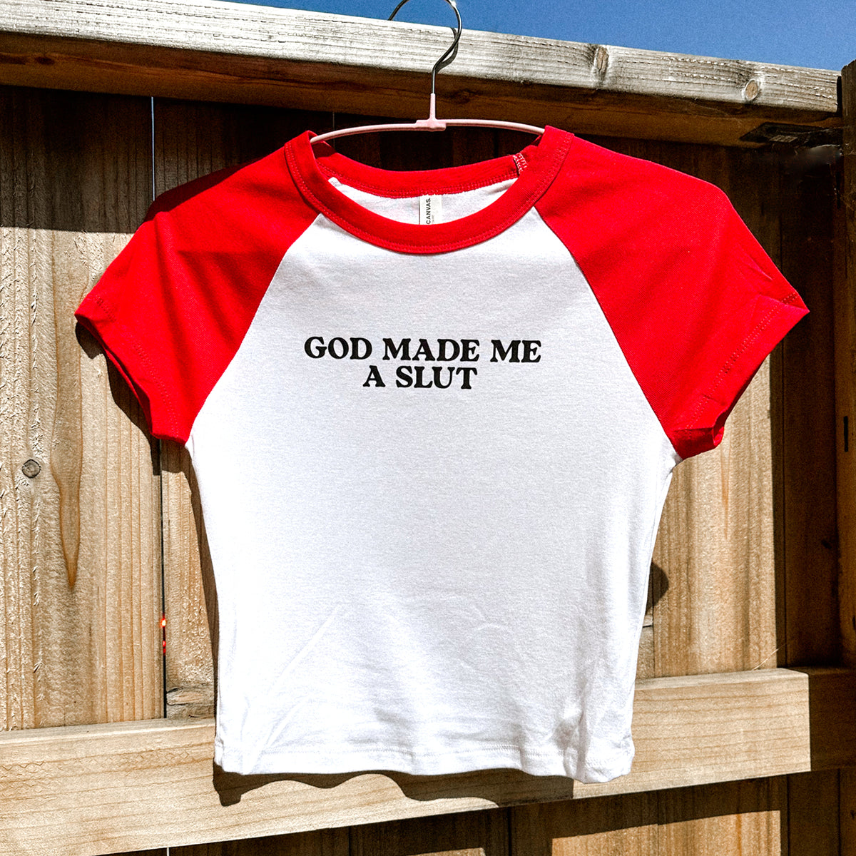 Y2K GOD MADE ME A SLUT Baby Tee | Red Cap Sleeve T-Shirt + Black Text Graphic